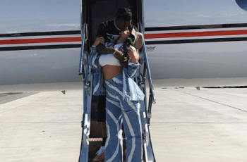 Kylie Jenner appears locking her lip on the plane’s door